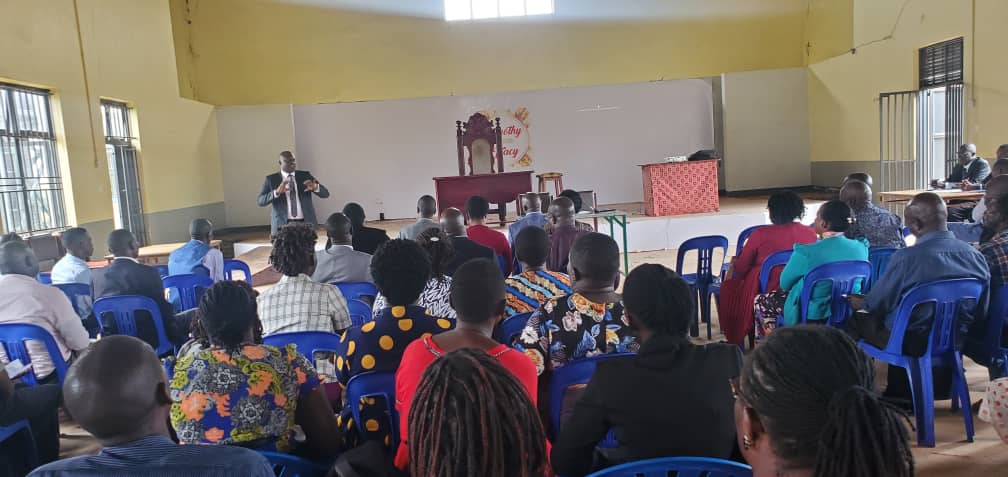 The Chief Administrative Officer - Kamuli, delivers words of wisdom to Lower Local Government Accounting officers, Town clerks, Town Agents and Parish chiefs in a performance review meeting at the Kamuli Youth center. The Chief Administrative Officer - Kamuli, addressing participants at the performance review meeting at the Youth center.