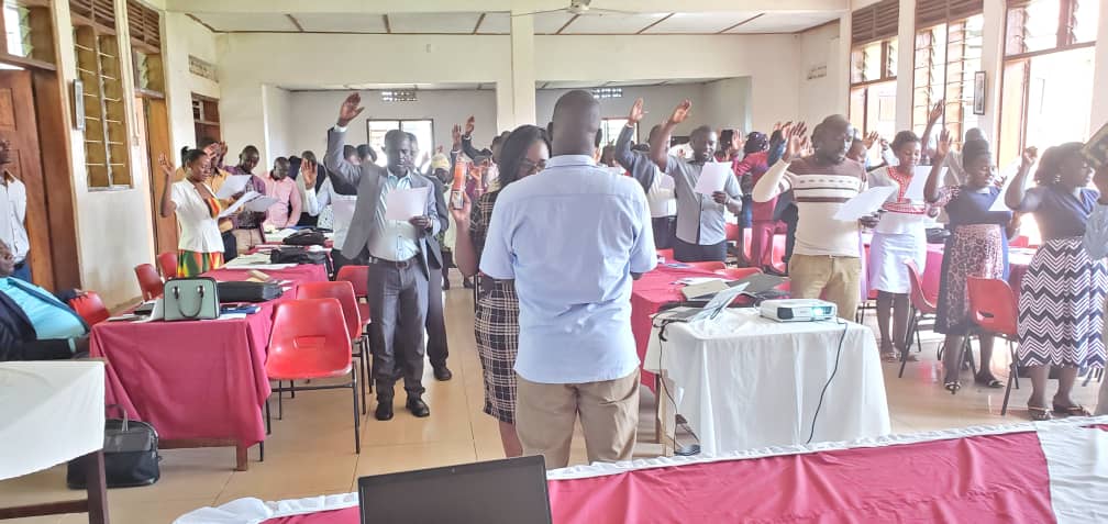 Deputy Chief Administrative Officer, Mr. Sentongo Badru giving his remarks during a capacity strengthening for district technical planning and sector leads plus implementing partners on Disability Inclusion. Plan international is implementing a 5 year sustainable development goal-WASH program in the district to upscale the experiences of water, sanitation and hygiene practices funded by PLAN Netherlands. Deputy Chief Administrative Officer